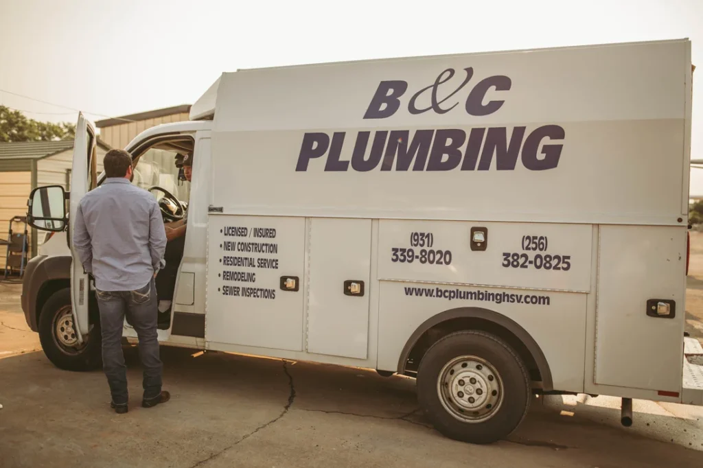 Licensed plumber from B & C Plumbing performing water heater installation in Huntsville, Alabama